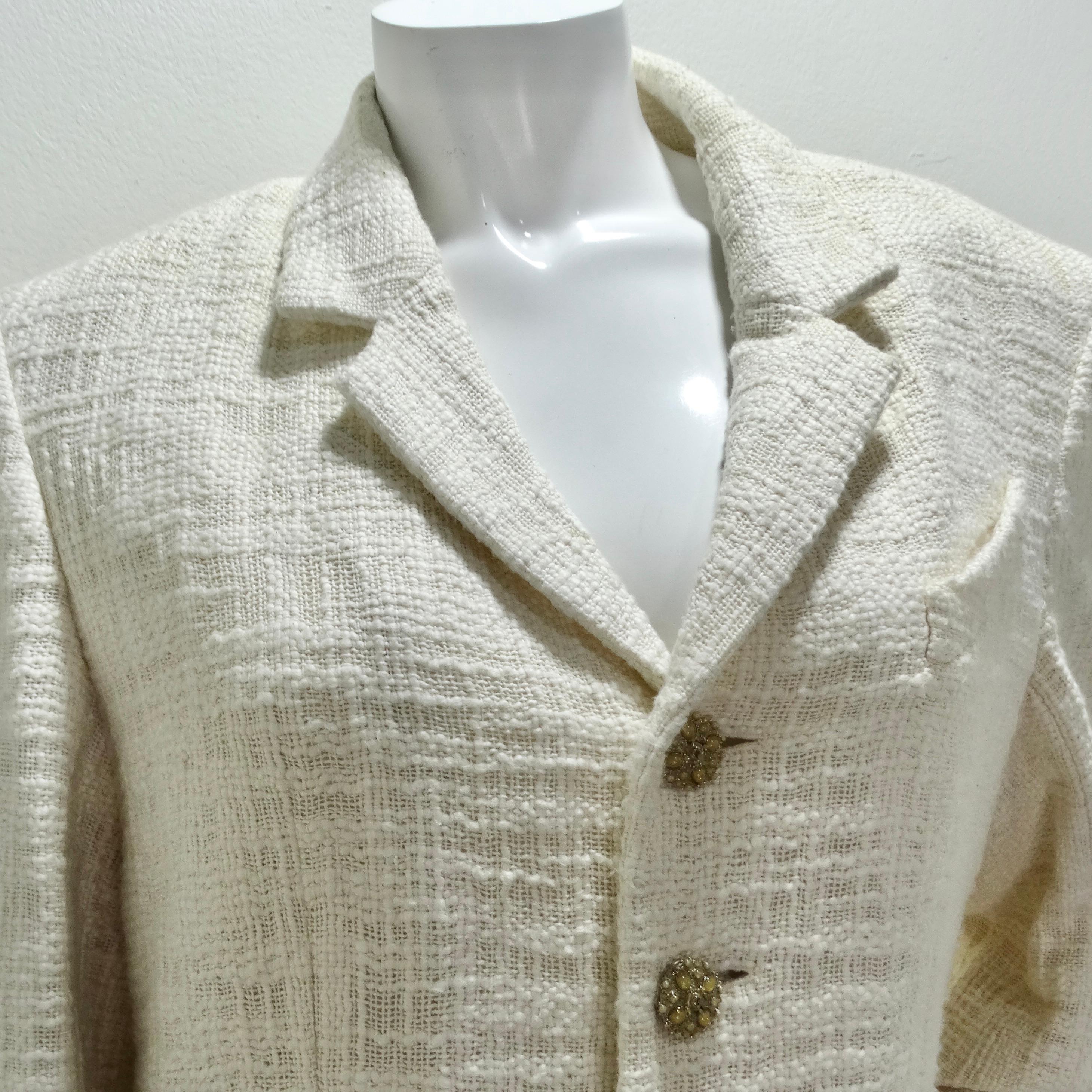 The Chanel 2012 Gripoix Tweed Blazer is an exquisite and luxurious piece from the Metier d’Art 