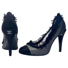 Chanel 2012 Lagerfeld CC Logo Black Lace Ruffle Cap Toe Pumps 38.5
