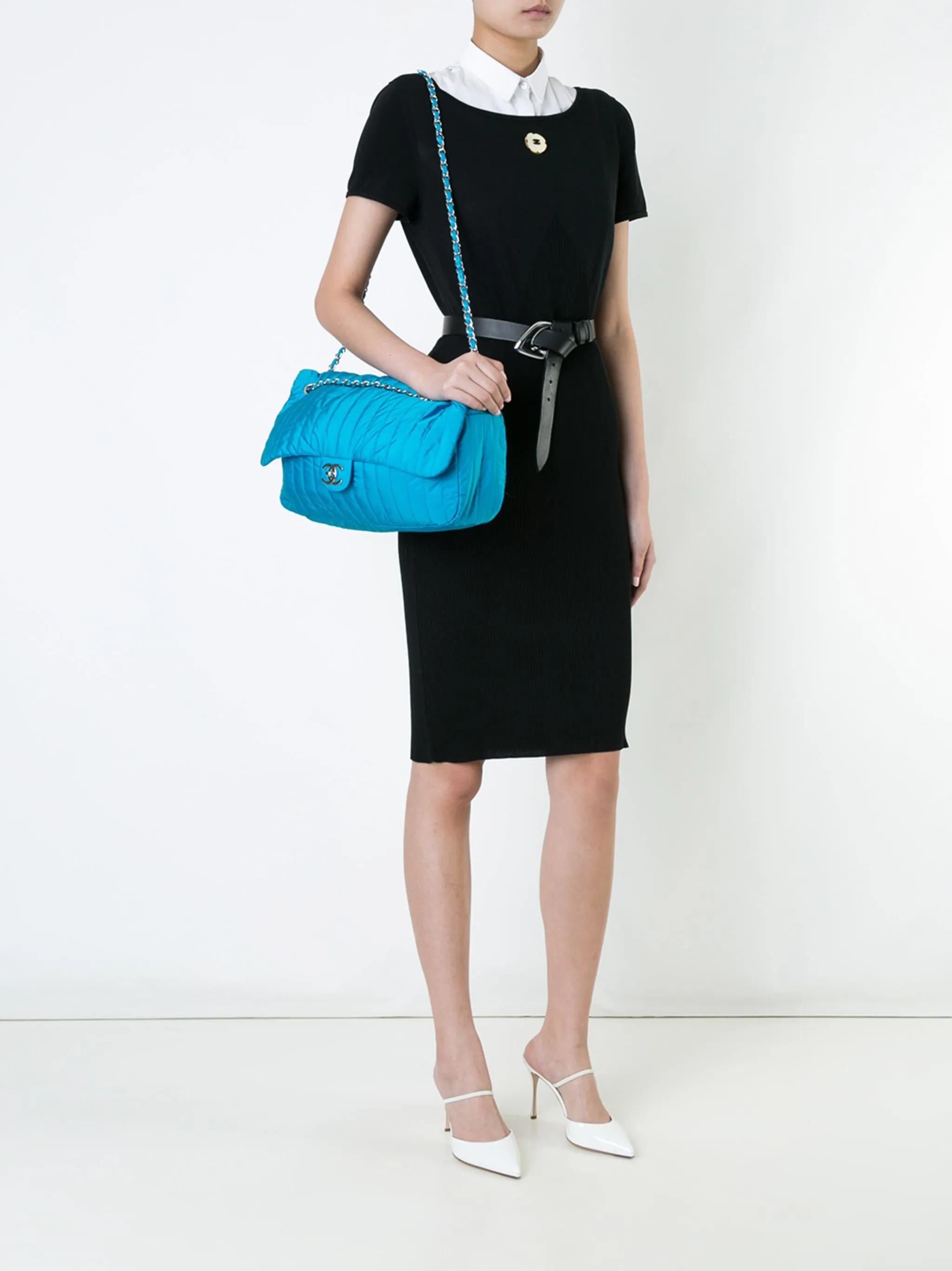 Chanel Turquoise Teal Nylon Stripe Quilted Classic Flap Shoulder Bag

Year: 2012

Silver hardware
Striped nylon quliting
Interwoven chain
Interlocking CC clasp
Interior zipper closure
Interior center zippered pocket
Strap drop: Single 19