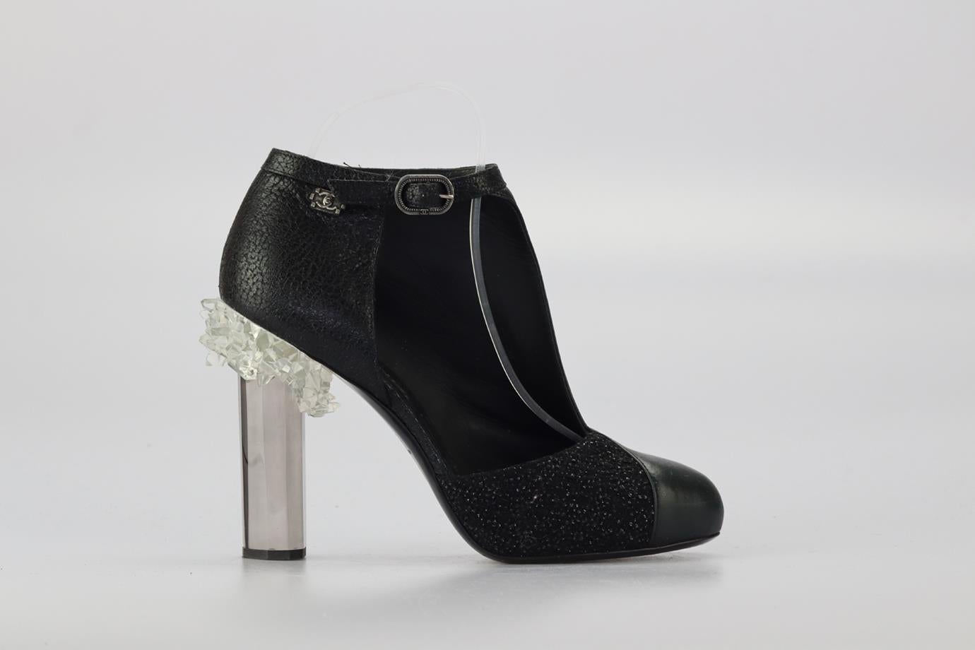 Chanel 2012 Tweed And Leather Ankle Boots. Black. Buckle fastening - Side. Does not come with - dustbag or box. EU 38.5 (UK 5.5, US 8.5). Insole: 9.6 in. Heel height: 4.3 in. Condition: Used. Good condition - Wear to soles. Some scuff marks to upper