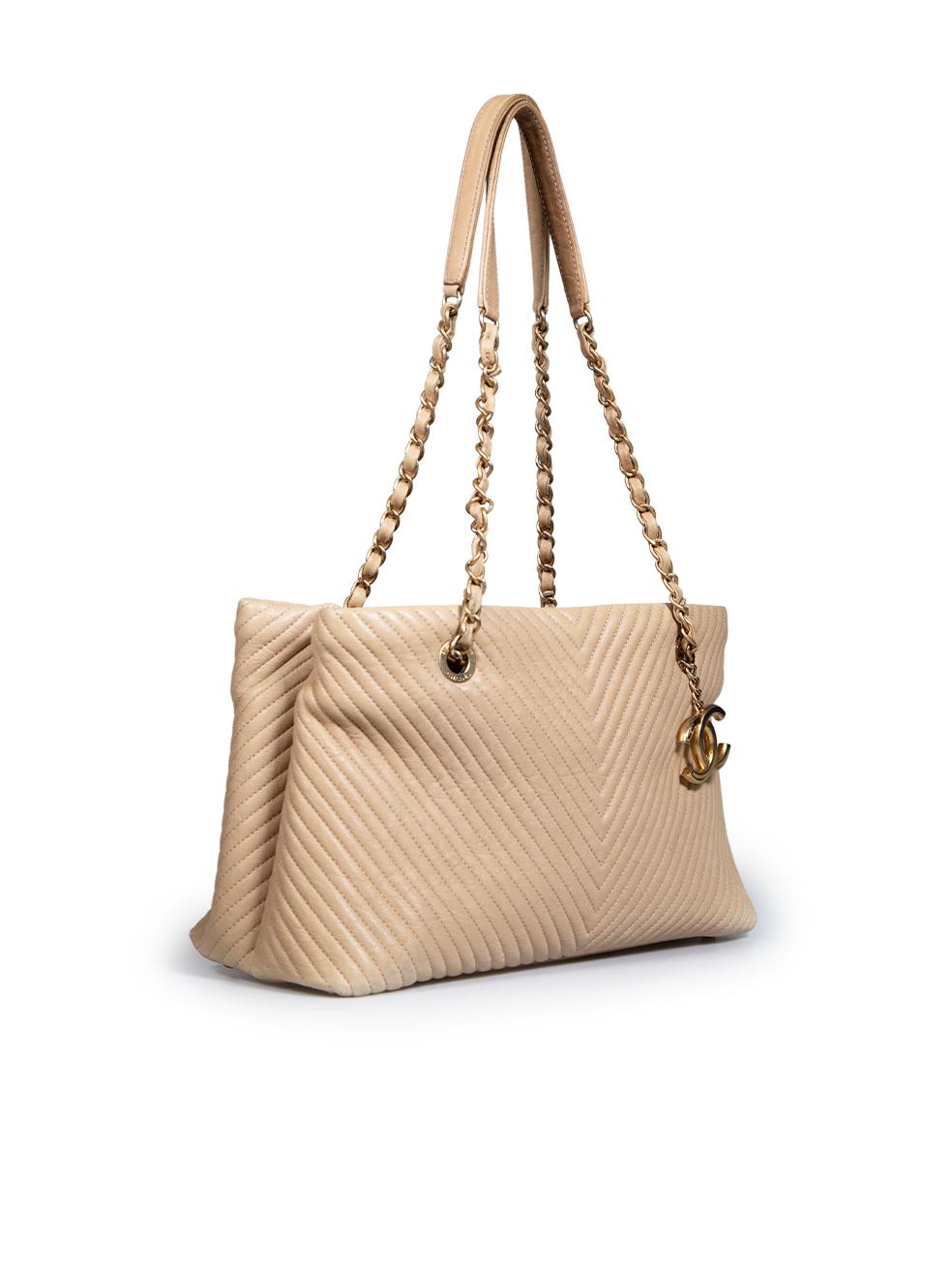 CONDITION is Very good. Minimal wear to the bag is evident. Discolouration and general creasing to the four bottom corners of the bag and the strap, light abrasion on the hardware logo and the end of the chain handle of this used Chanel designer