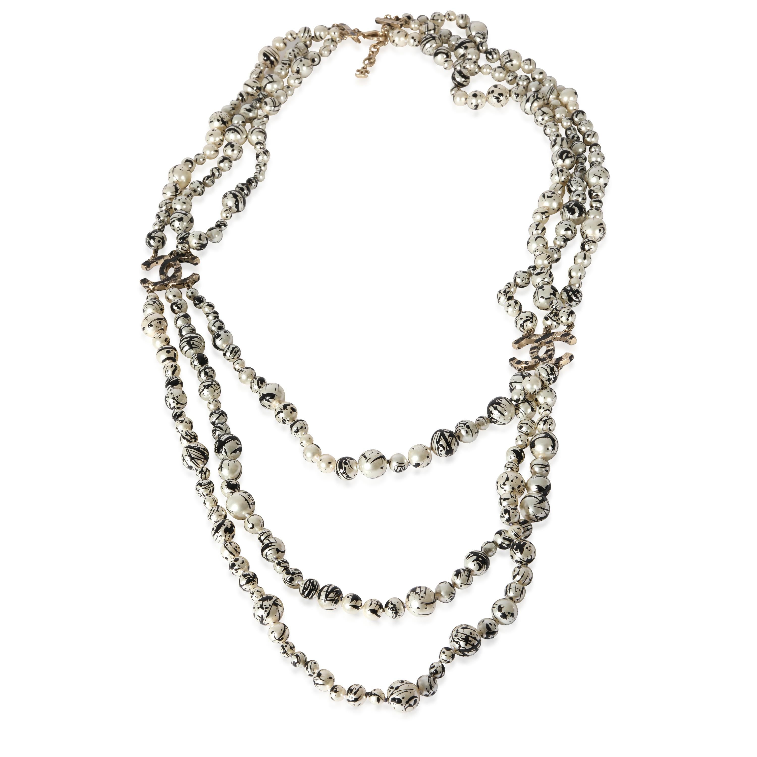 Chanel 2013 Faux Pearl Splatter CC Multistrand Necklace

PRIMARY DETAILS
SKU: 128062
Listing Title: Chanel 2013 Faux Pearl Splatter CC Multistrand Necklace
Condition Description: Retails for 2495 USD. In excellent condition. 35 inches in length.