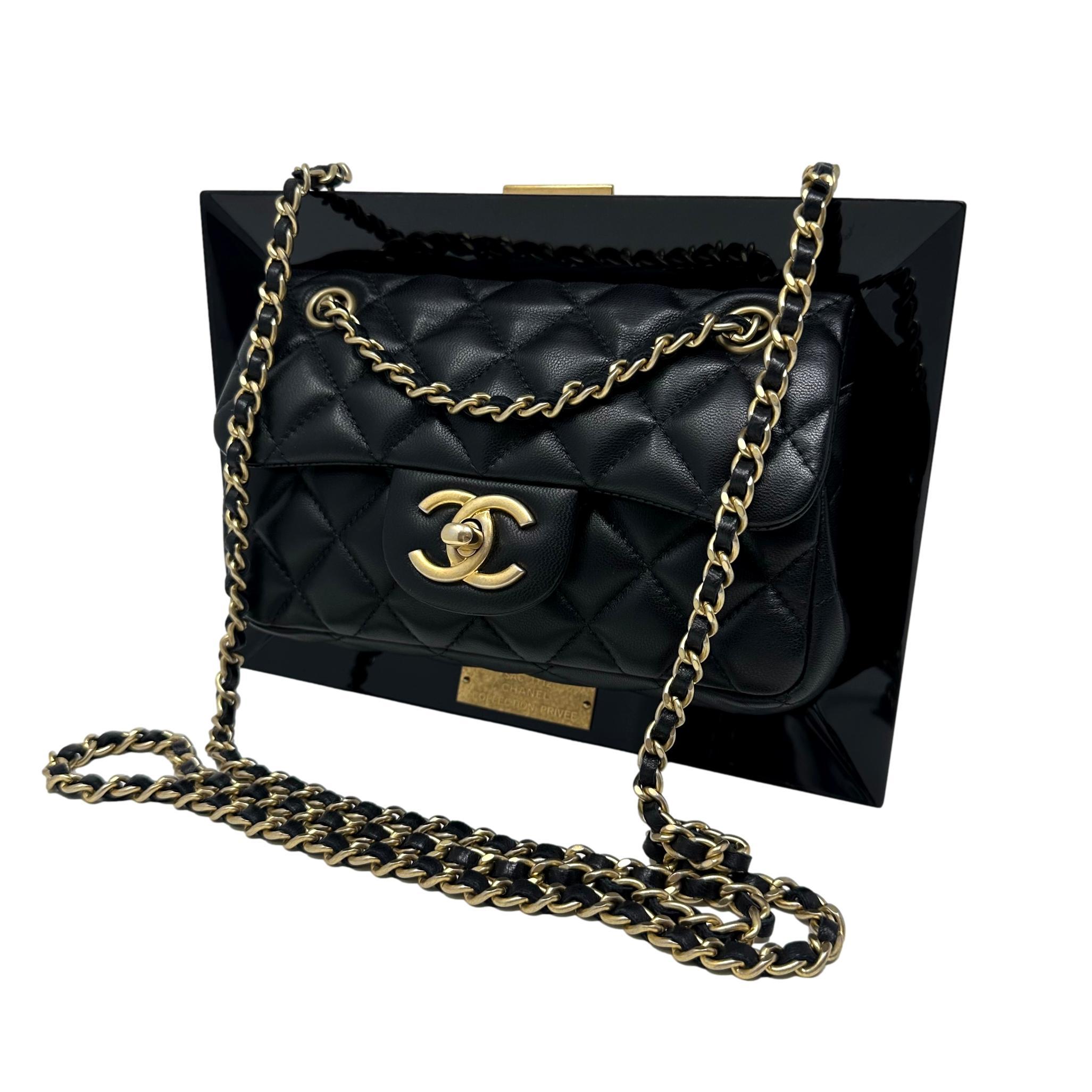 Description: This is a gorgeous Limited Edition Chanel Black Plexiglass and Lambskin Leather Picture Frame Bag from the 2014 Runway 