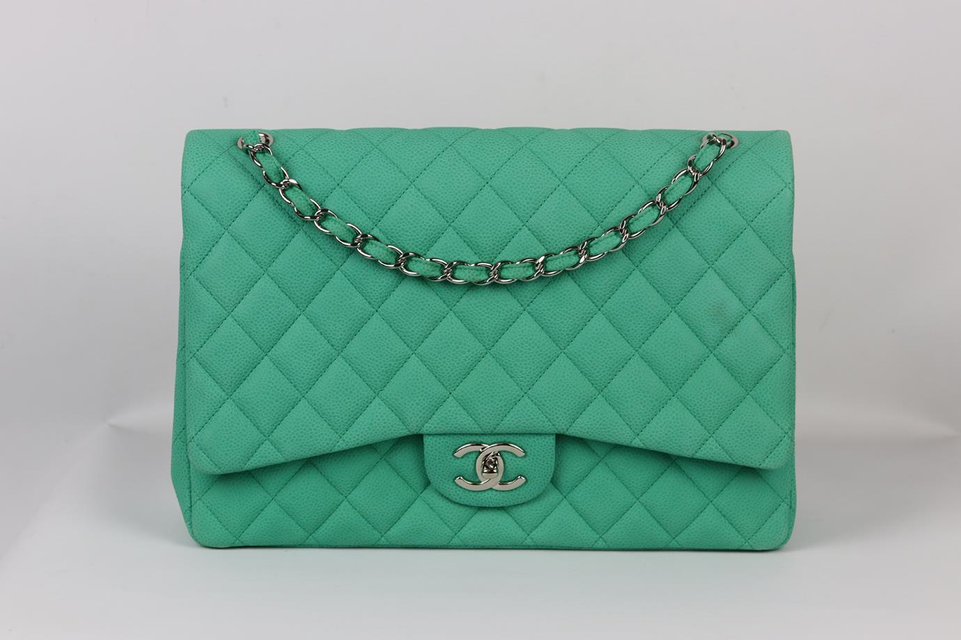 Chanel 2014 Maxi Classic quilted matte caviar eather double flap shoulder bag. Made from turquoise-green quilted matte caviar leather with matching leather interior and silver-tone hardware and chain shoulder straps. Turquoise-green. Twist lock