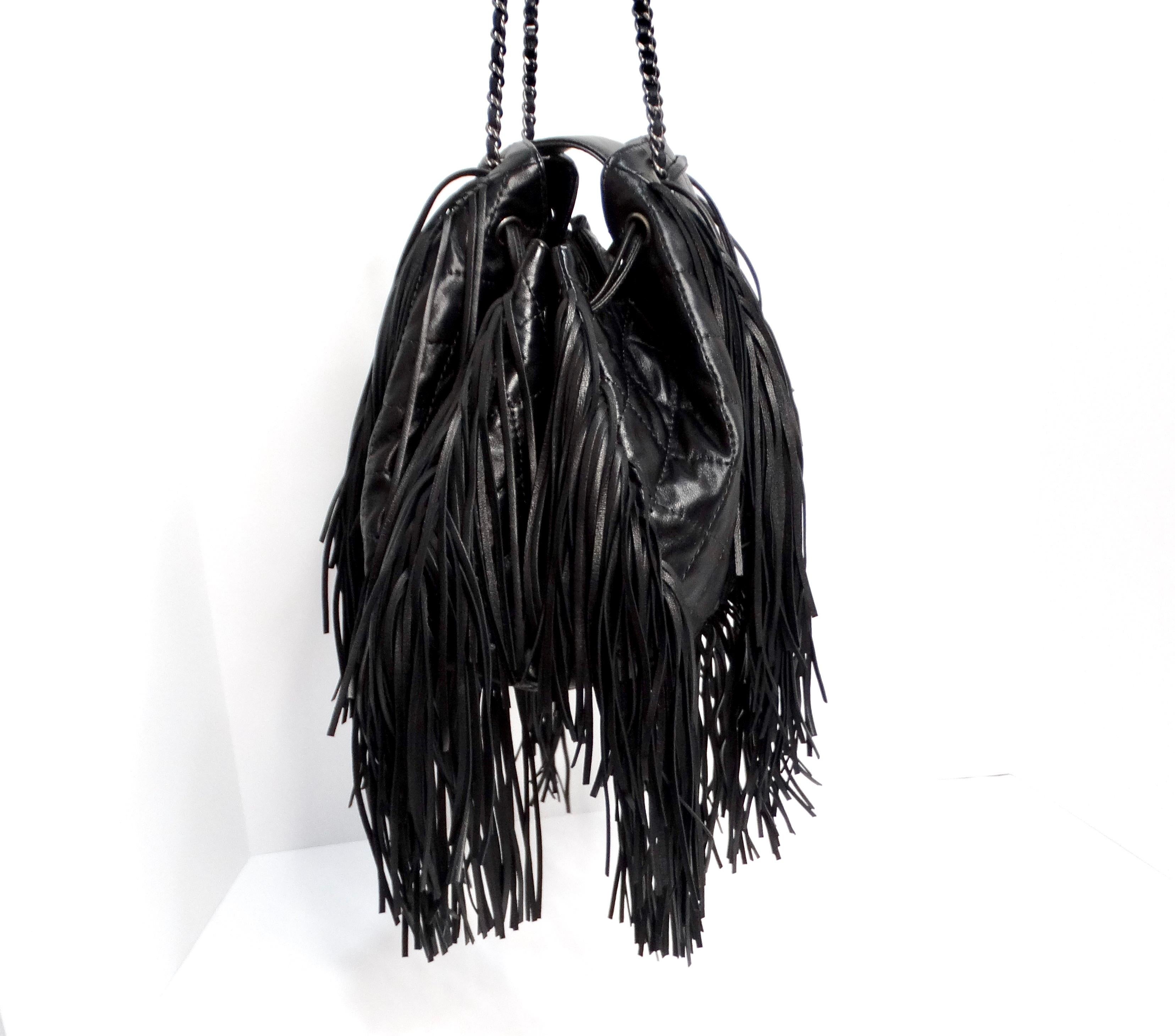 Women's or Men's Chanel 2014 Paris-Dallas Black Quilted Lambskin Drawstring Fringe Bucket Bag For Sale