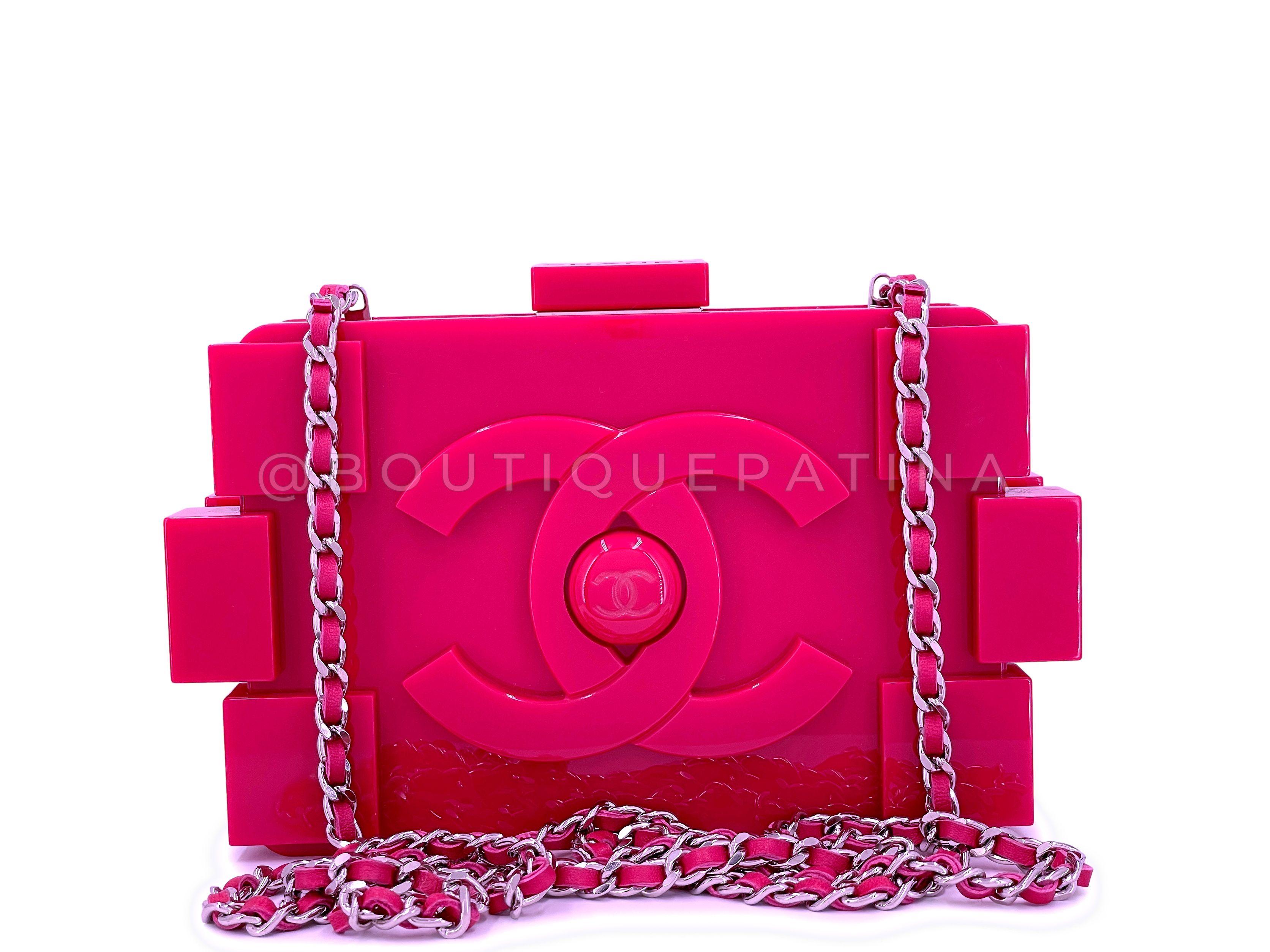 Store item: 67522
Chanel 2014 Pink Lego Brick Minaudière Plexiglass Clutch Shoulder Bag with woven chain in shiny ruthenium hardware.

Woven chain can be tucked/hidden inside or carried as a crossbody.

Dimensions are for the outside of the bag -
