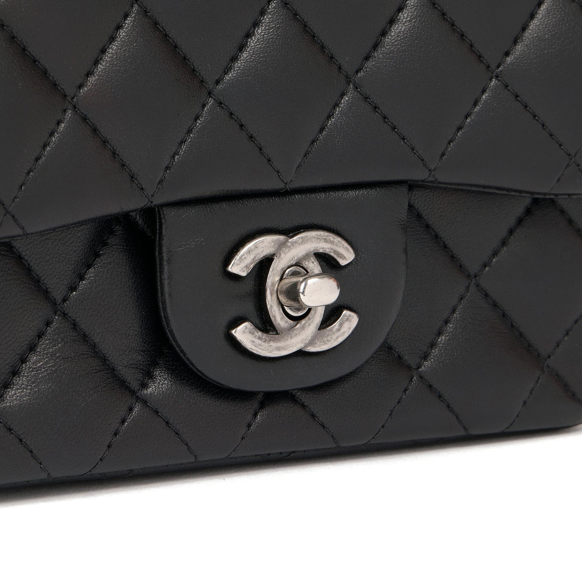 CHANEL 
Black Quilted Lambskin Leather Mini Flap Bag

Xupes Reference: CB329
Serial Number: 20005729
Age (Circa): 2015
Accompanied By: Chanel Dust Bag, Box, Authenticity Card, Care Booklet
Authenticity Details: Date Stamp (Made in France) 
Gender: