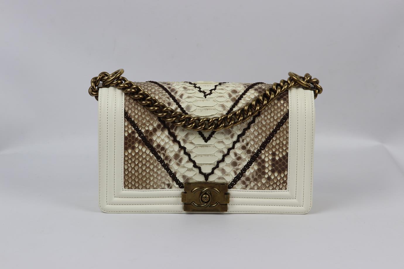 <ul>
<li>Chanel 2015 Boy medium embroidered python and leather shoulder bag.</li>
<li>Made from tonal-beige python and cream leather with matching leather interior and brown embroidery and silver-tone hardware and chain shoulder