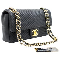 Chanel - Sac à bandoulière à rabat en cuir à chaîne et à chevrons, 2015