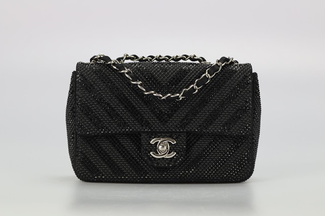 Chanel 2015 Classic Mini Rectangle Flap Strass Embellished Shoulder Bag. Black. Twist lock fastening - Front. Comes with - dustbag and authenticity card. Height: 5 in. Width: 7.8 in. Depth: 2.2 in. Handle drop: 12 in. Strap drop: 20.9 in. Condition: