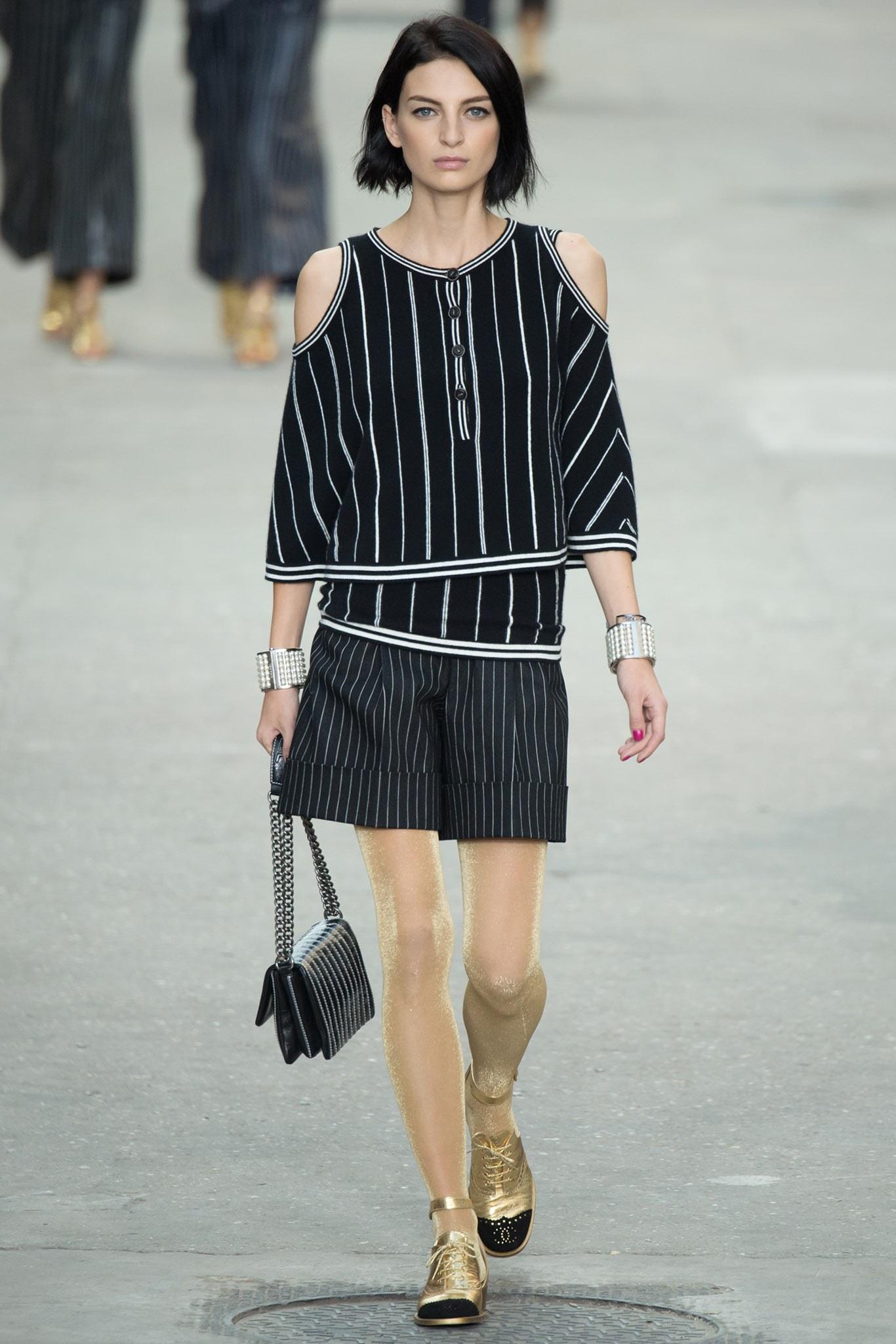 Chanel 2015 Spring Runway Grey Pinstripe High Waist Shorts.  $1950 original retail price.  High waist shorts with side pockets, pleat front, and wide cuffs.  Marked size FR36 (USA 4).  To fit 26” waist, 35” hip,  19” total length.  73% cotton, 25