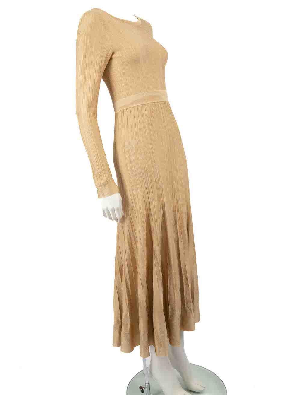 CONDITION is Very good. Hardly any visible wear to dress is evident on this used Chanel designer resale item.
 
 
 
 Details
 
 
 2016
 
 Paris-Rome Metiers d'Art model
 
 Beige
 
 Viscose
 
 Maxi dress
 
 Knitted and stretchy
 
 Glitter accent
 
