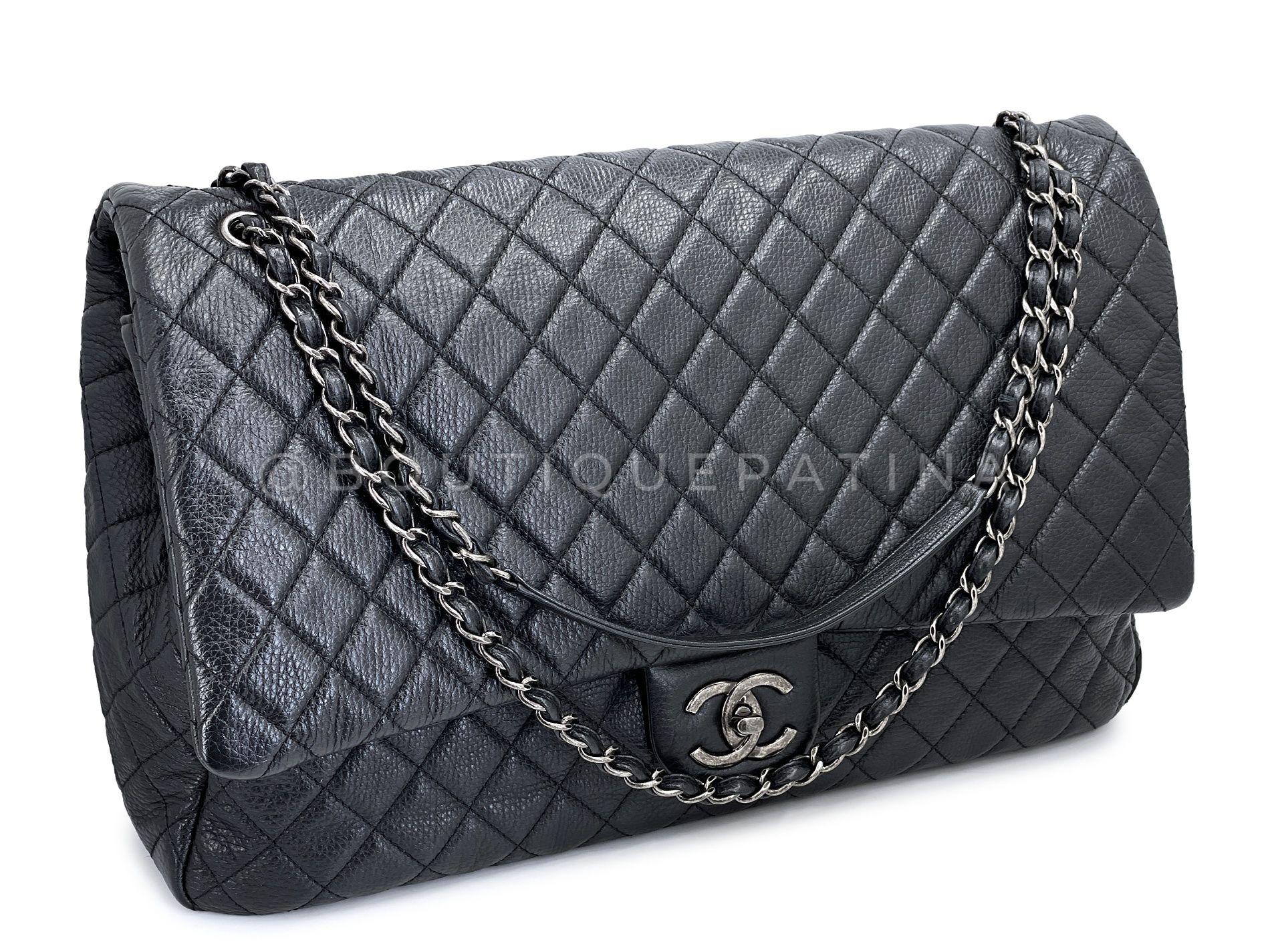 Store item: 68161
The Chanel Black XXL Airlines Travel Classic Flap Bag is the bag that everyone has been talking about the last few years, and one of the most talked about from the Chanel runway.

Made from luxurious calfskin on the outside and a