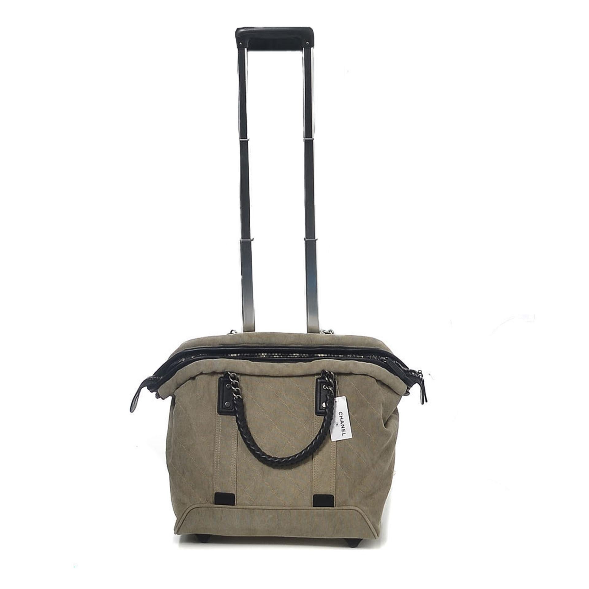 Chanel 2016 Chic Taupe Beige Travel Carry-On Trolley Set

Luggage Bag Set of Two Bags

Bag 1:  Rolling Trolley Bag
Ruthenium hardware
Grey beige canvas
Rolled top handles
Rolling wheels
Top zipper
Red burgundy nylon interior
Retractable handle 
Made