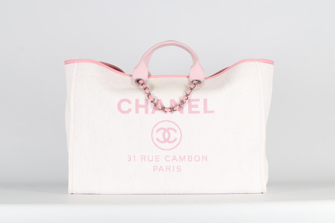 <ul>
<li>Chanel 2016 Deauville Extra Large Canvas And Leather Tote Bag.</li>
<li>Pink and purple.</li>
<li>Magnetic fastening - Top.</li>
<li>Comes with Authenticity Card.</li>
<li>Does not come with - dustbag or box.</li>
<li><strong>Model: