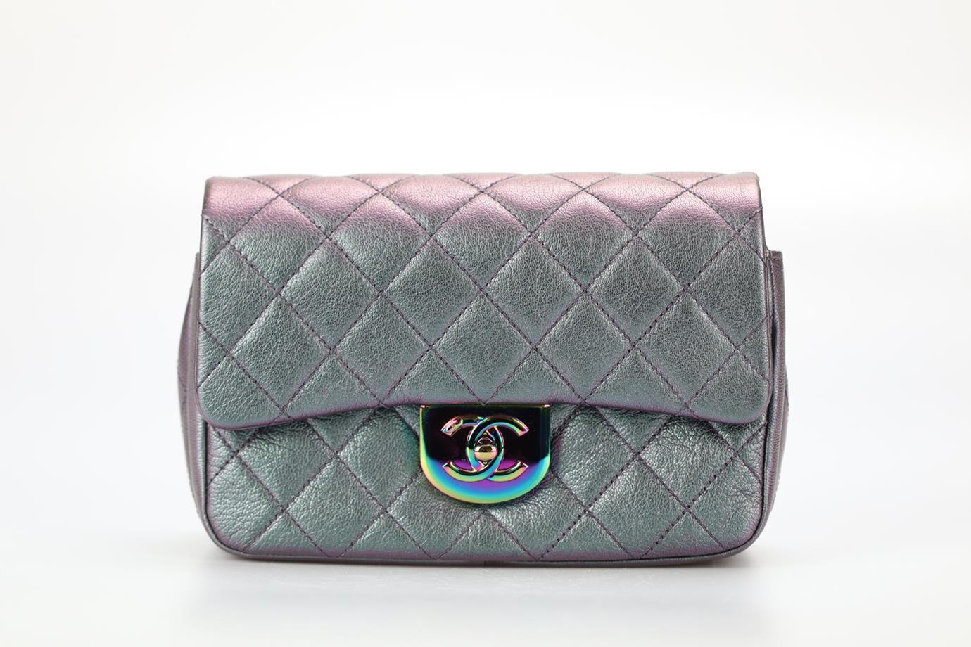 Chanel 2016 Double Carry Waist Chain Flap Small Irisdescent Quilted Leather Crossbody Bag. Green and purple. Twist lock fastening - Front. Comes with - authenticity card and dustbag. Height: 5.8 in. Width: 9 in. Depth: 3 in. Strap drop: 20 in.
