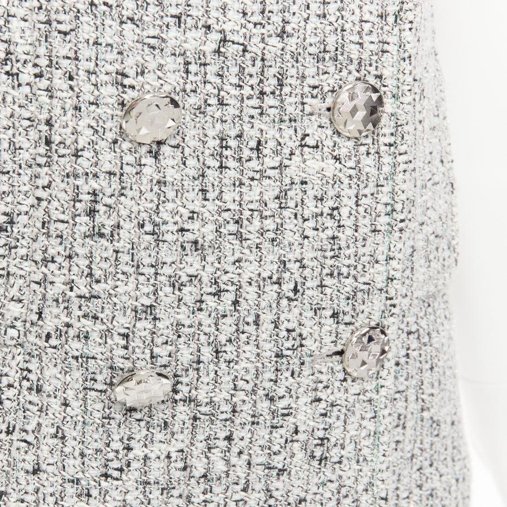 CHANEL 2016 Fantasy Tweed silver CC buttons cuffed sleeves jacket FR36 S
Référence : NILI/A00014
Marque : Chanel
Designer : Karl Lagerfeld
Collectional : 2016 - Défilé
Matière : Coton, mélange
Couleur : Gris, Argent
Motif : Tweed
Fermeture :