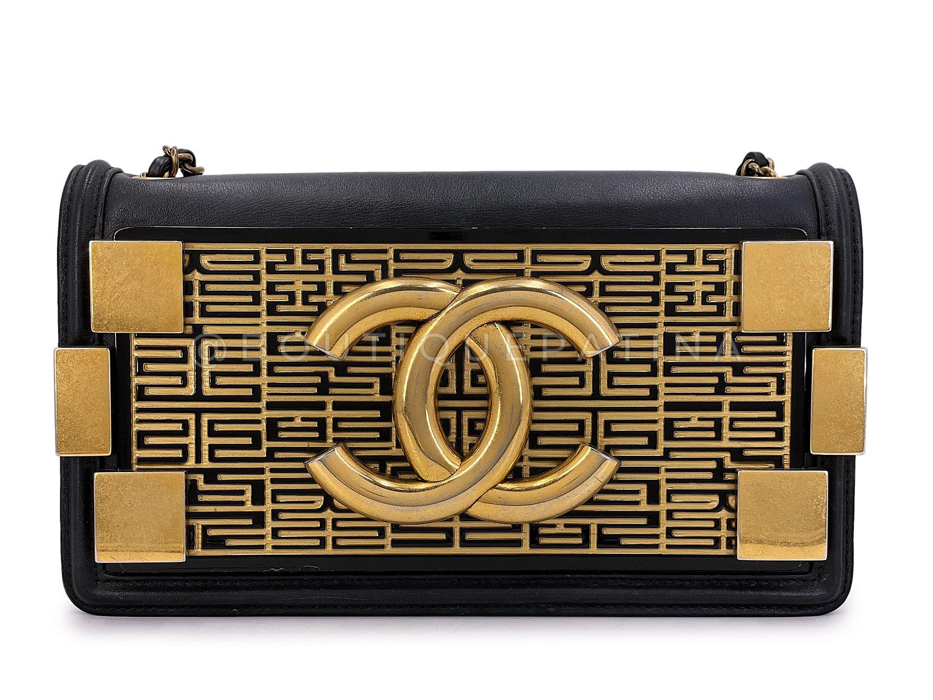 Store item: 67967
Rarely seen collectible from Lagerfeld's 2016 Paris-Seoul Cruise runway, this bag is a substantial piece - made of butter-soft lambskin base and a framed bronze hued plate with etched black enamel patterns from the Seoul