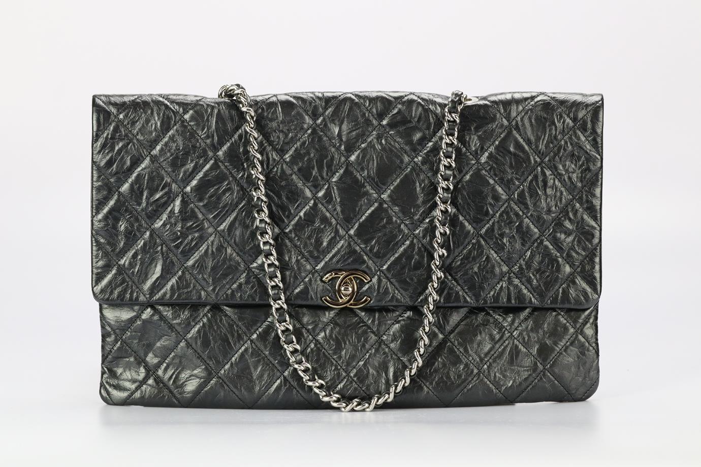 Chanel 2017 Bing Bang Flap Quilted Leather Shoulder Bag. Black. Twist lock fastening - Front. Comes with - dustbag and authenticity card. Height: 9.9 in. Width: 15.8 in. Depth: 0.3 in. Strap drop: 10.8 in. Condition: Used. Very good condition - Few