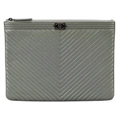 Chanel 2017 Cassic Boy O-case Chevron Caviar Leather Clutch
