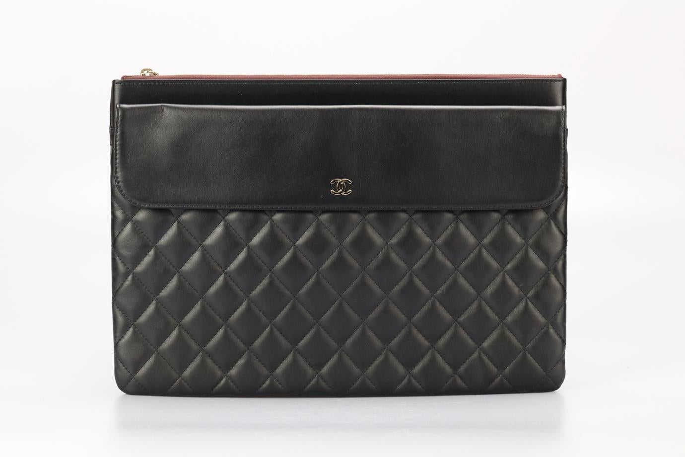 Chanel 2017 Flp O-case Large Quilted Leather Clutch. Black. Zip fastening - Top. Comes with - authenticity card. Does not come with - dustbag or box. Height: 9.5 in. Width: 13.5 in. Depth: 0.6 in. Condition: Used. Very good condition - Few light