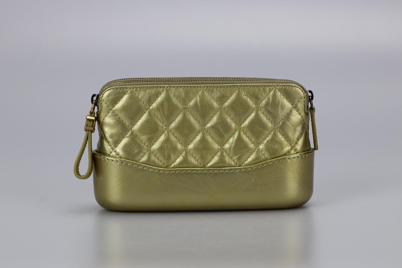 Chanel 2017 Gabrielle Clutch With Chain Quilted Leather Shoulder Bag. Gold. Zip fastening - Top. Comes with - authenticity card. Does not come with - dustbag or box. Height: 4.1 in. Width: 6.8 in. Depth: 1.8 in. Handle drop: 17.5 in. Strap drop: 32