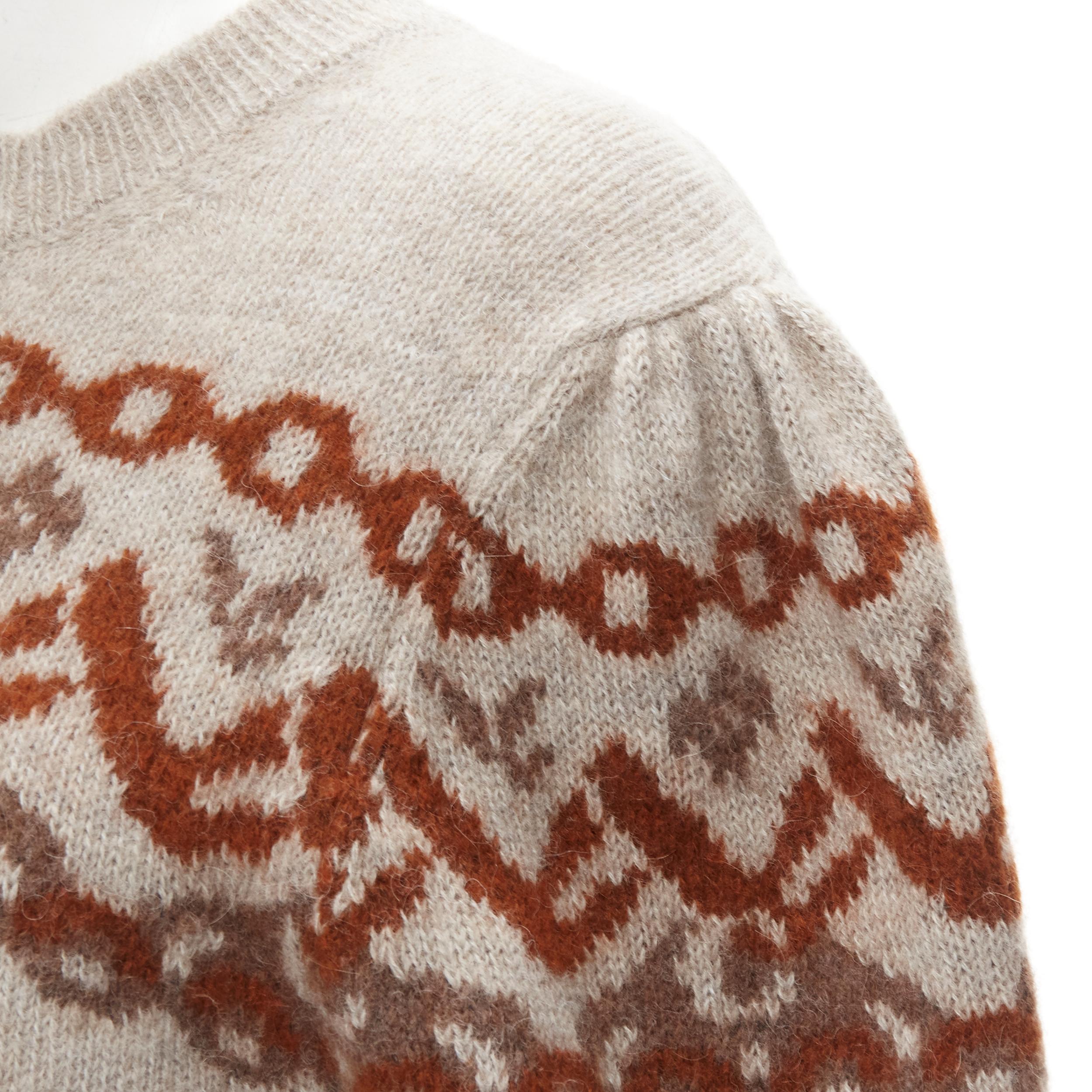 CHLOE alpaca wool stone grey orange fairisle victorian puff sleeve sweater M
Brand: Chloe
Material: Alpaca
Color: Grey
Pattern: Fairisle
Extra Detail: Puff sleeve design. Ribbed sleeve and hem.
Made in: Italy

CONDITION:
Condition: Excellent, this