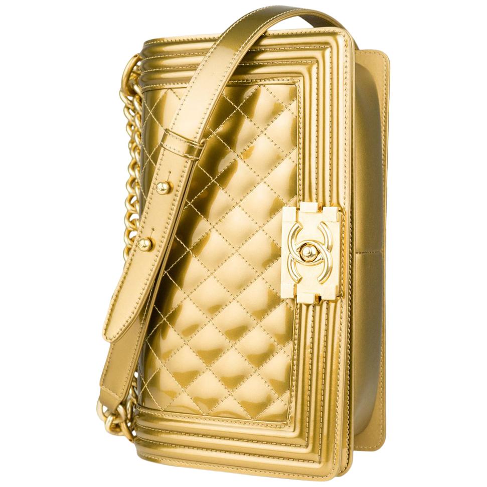 Chanel gold metallic medium size boy bag

Year: 2017 
Patent Leather in gold
Gold Hardware
Interior lined gold lambskin
Boy bag clasp closure
5