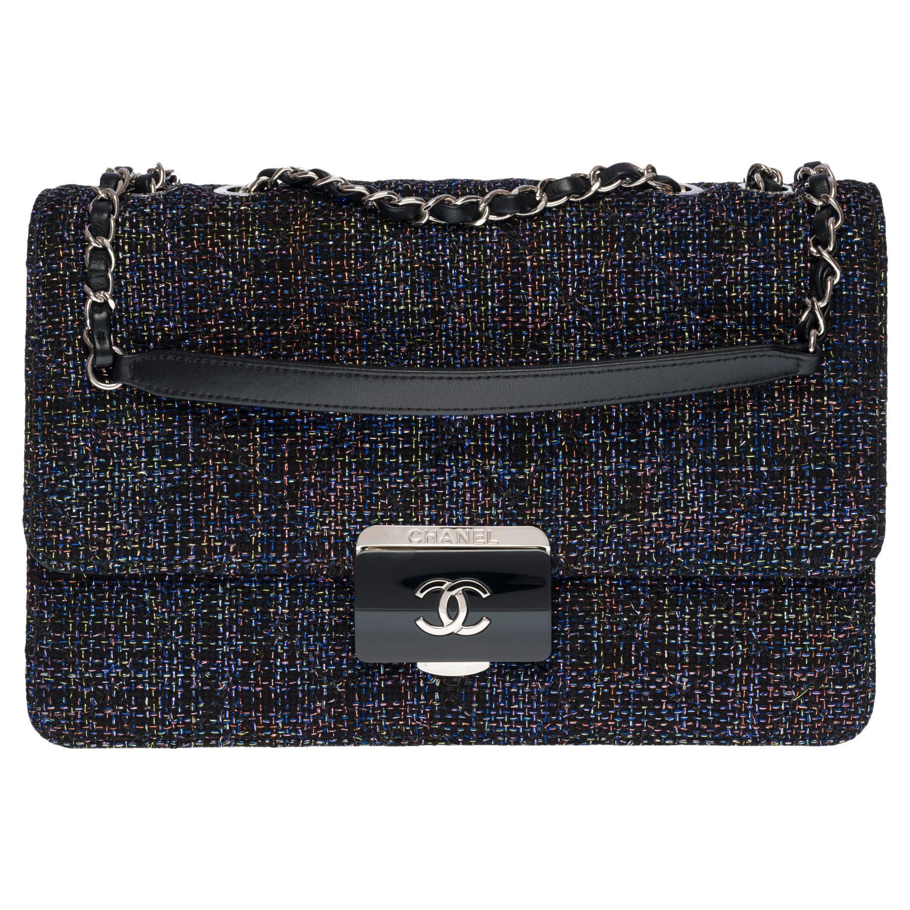 Chanel 2017  Rare Tweed Lambskin Quilted Beauty Lock Multicolor Black Flap Bag

Stunning Silver CC Push lock
Black leather with multicolored tweed
Silver chain black leather threaded shoulder straps
 
Dimensions: 11.41