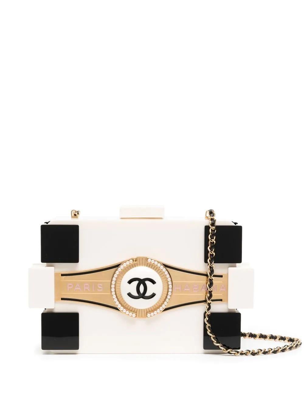 Karl Lagerfeld’s time at Chanel has gone down in history as one of the most important partnerships in fashion history. This iconic clutch from his final runway show is a collector's piece that has been maintained in mint condition. The Cuban