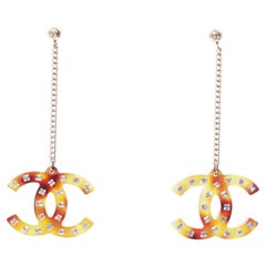 CHANEL 2018 brown tortoise clear resin crystal CC dangling earrings pair