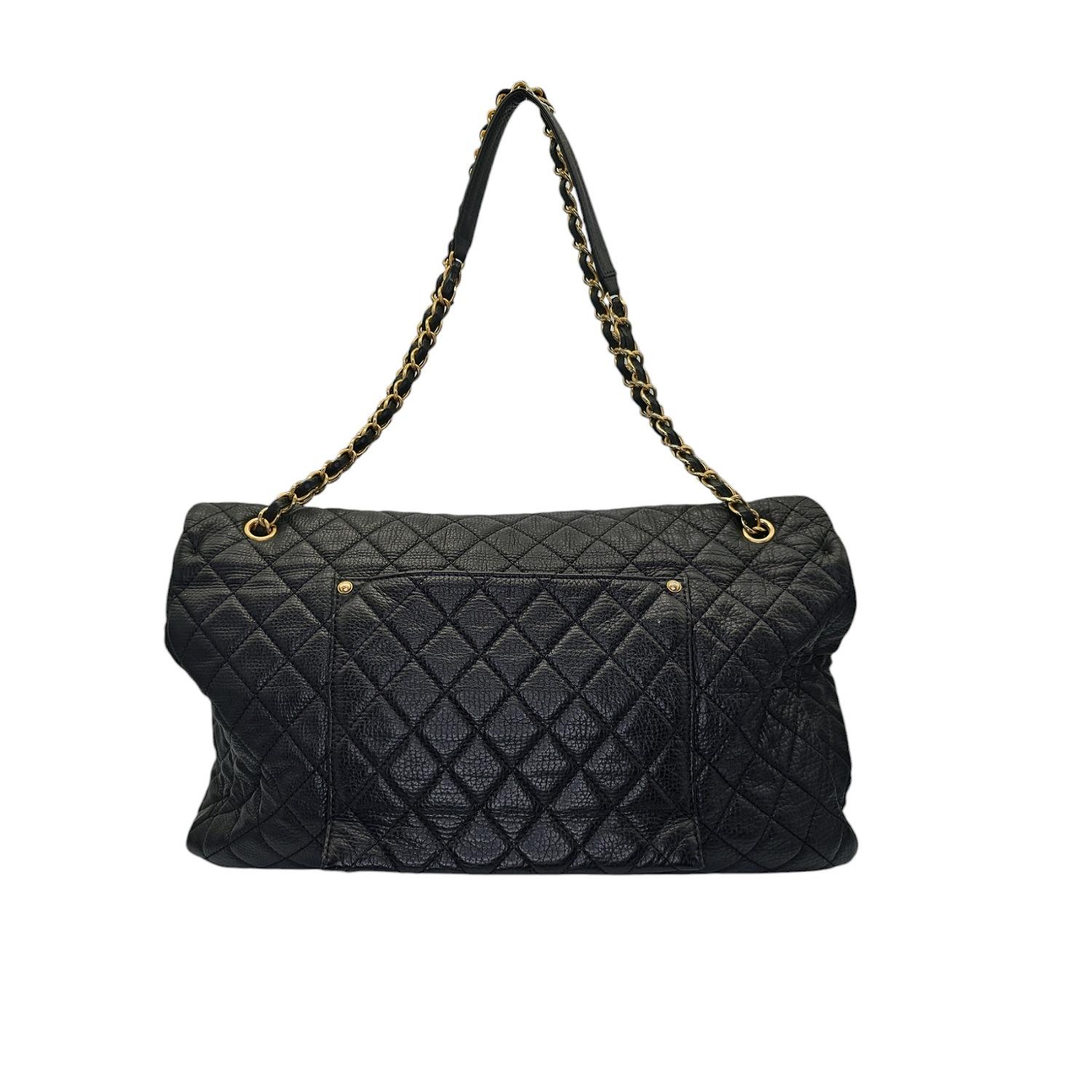 Chanel 2018 Calfskin Quilted XXL Travel Flap Bag Black In Good Condition In Scottsdale, AZ