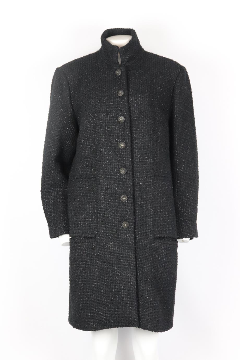 Chanel 2018 cotton and wool blend tweed coat. Black. Long sleeve, crewneck. Button fastening at front. 60% Cotton, 14% acrylic, 13% wool, 13% polyamide; lining: 100% silk. Size: FR 50 (UK 22, US 18, IT 54). Shoulder to shoulder: 17 in. Bust: 40 in.