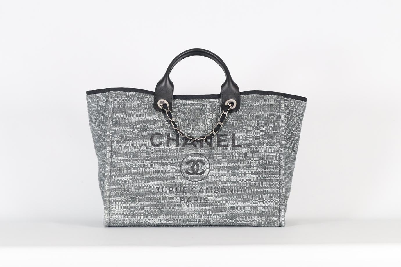 <ul>
<li>Chanel 2018 Deauville Medium Raffia And Leather Tote Bag.</li>
<li>Grey and black.</li>
<li>Magnetic fastening - Top.</li>
<li>Does not come with - Authenticity card, dustbag or box.</li>
<li><strong>Model: