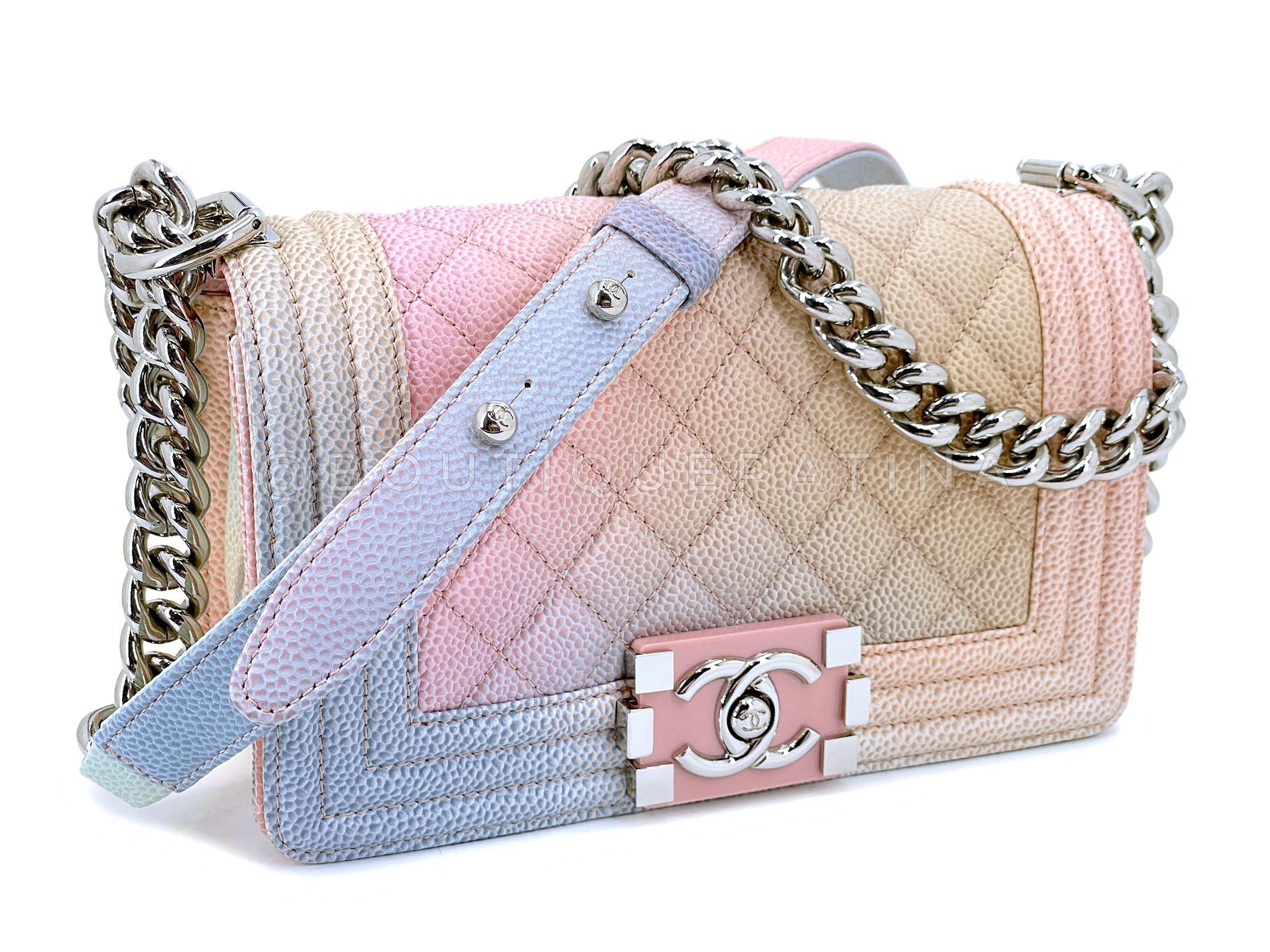 Store item: 68414
Chanel 2018 Pastel Rainbow Caviar Small Boy Flap Bag SHW

In pastel pink rainbow caviar leather and silver hardware.  The ultimate 