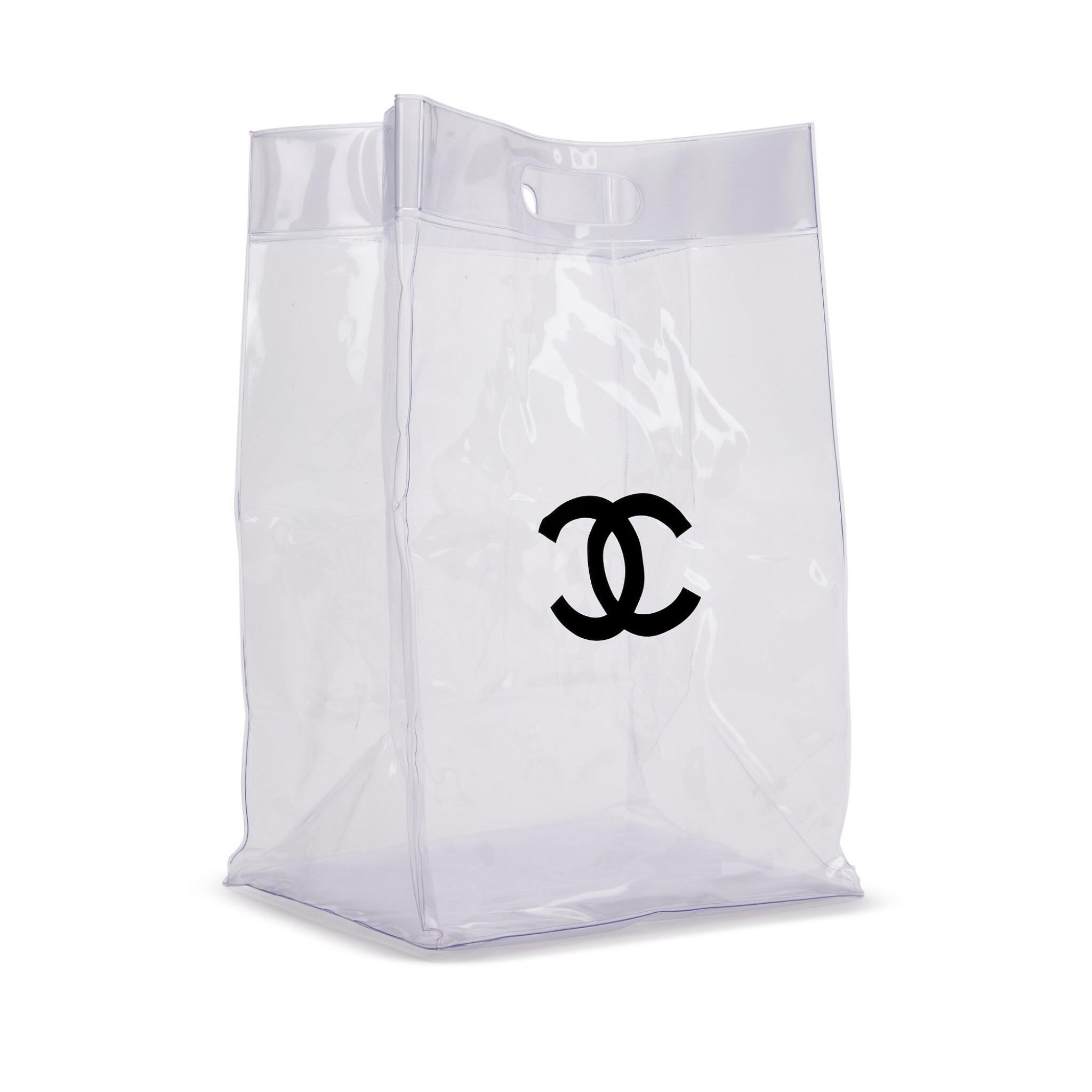 
Chanel 2018 Clear Plastic CC Tote

Transparent plastic clear vinyl tote with handle 
This bag is not lined
This item was produced as a VIP gift for runway show attendees

16.5