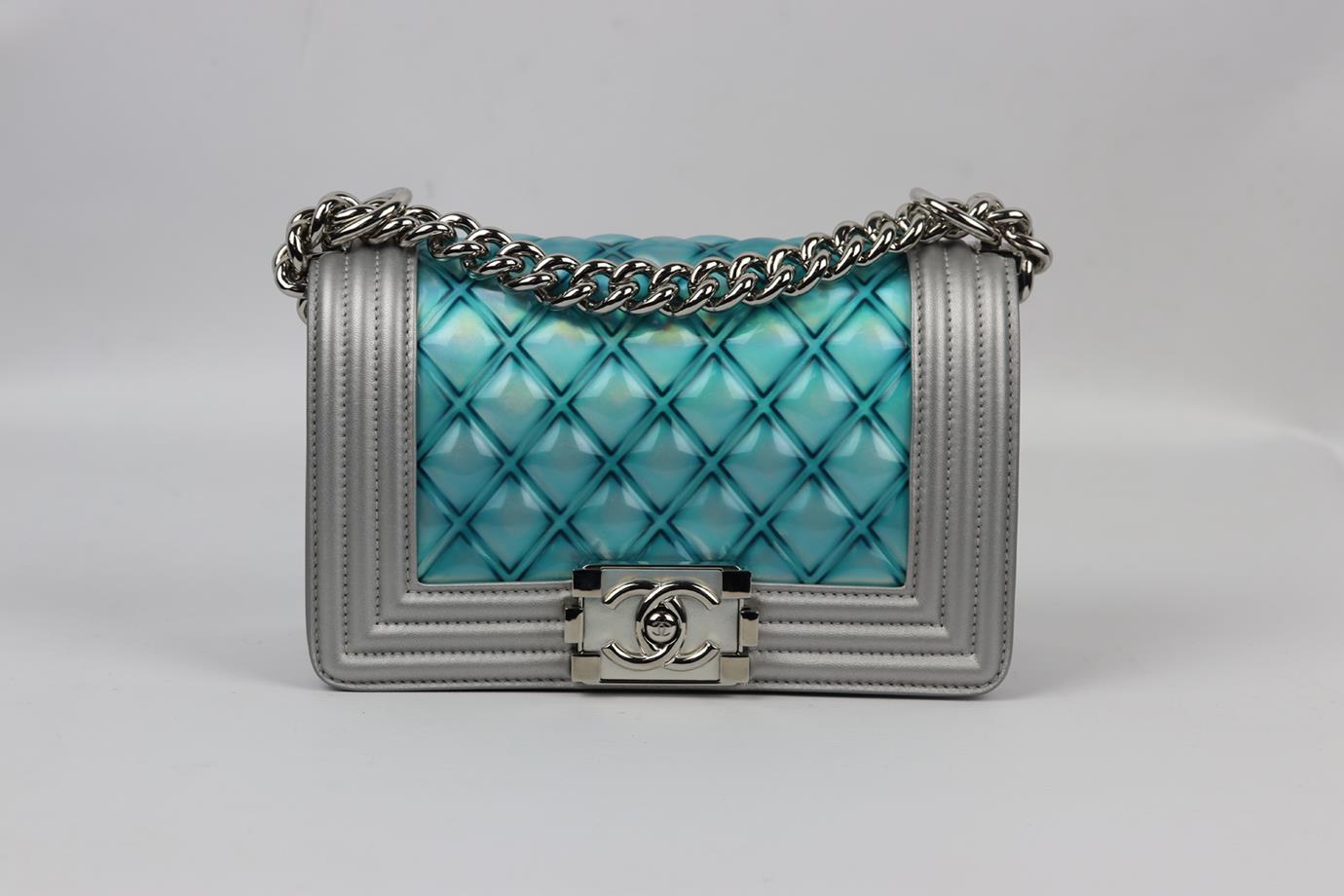 <ul>
<li>Chanel 2018 Water Boy small quilted pic and leather shoulder bag.</li>
<li>Made from blue quilted pvc with silver lambskin-leather and matching leather interior and palladium chain shoulder straps.</li>
<li>Blue and silver.</li>
<li>Push