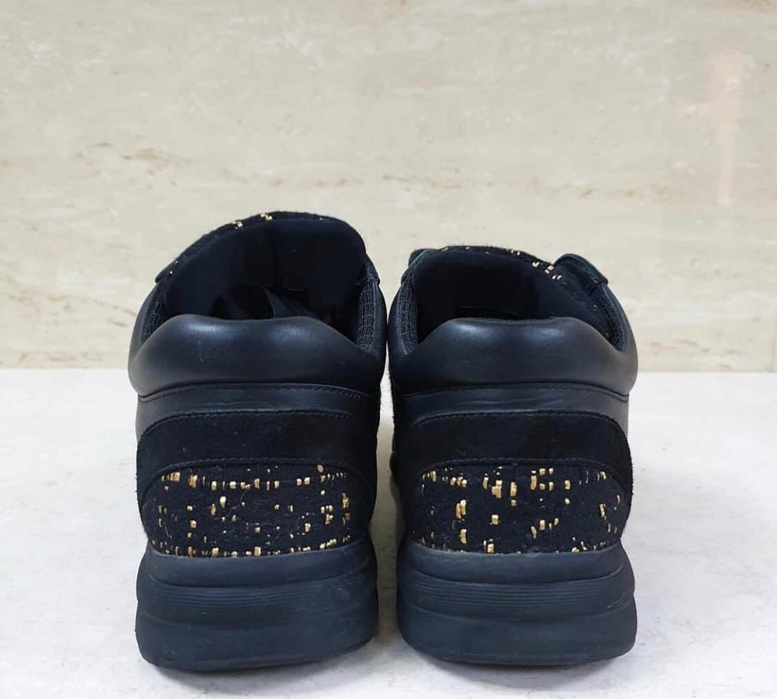 chanel black sneakers with gold cc