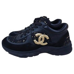Chanel 2019 Black and Gold CC Logo Tweed Leather Sneakers For Sale at  1stDibs  chanel black and gold sneakers, chanel black sneakers with gold  cc, gold chanel sneakers