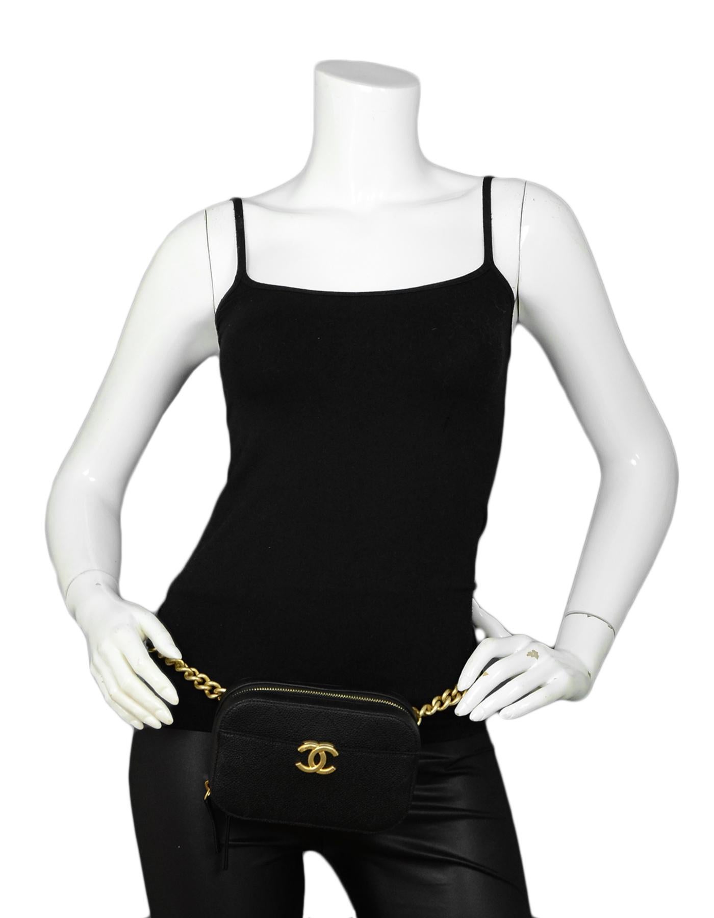 Chanel 2019 Black Caviar Grained Calfskin Quilted CC Waist Bag

Made In: France
Year of Production: 2019
Color: Black
Hardware: Matte goldtone hardware
Materials: Caviar grained calfskin
Lining: Black textile lining
Closure/Opening: Zip around and