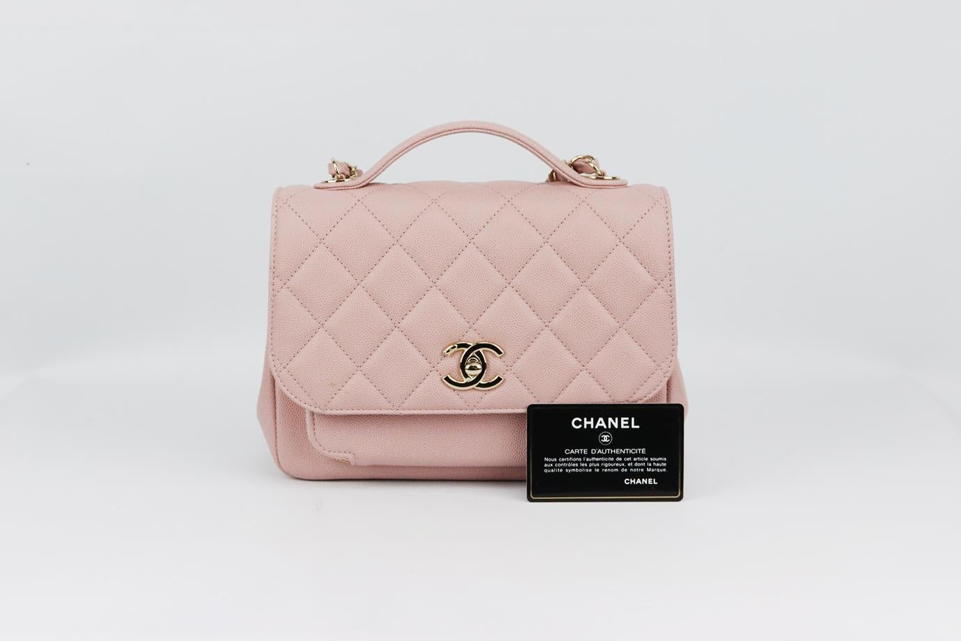 Made in Italy, this beautiful 2019 Chanel 'Business Affinity' shoulder bag has been made from light-pink Caviar leather exterior, this piece is decorated with Chanel's gold-tone twist-lock CC logo on the front and finished with a silver chunky chain