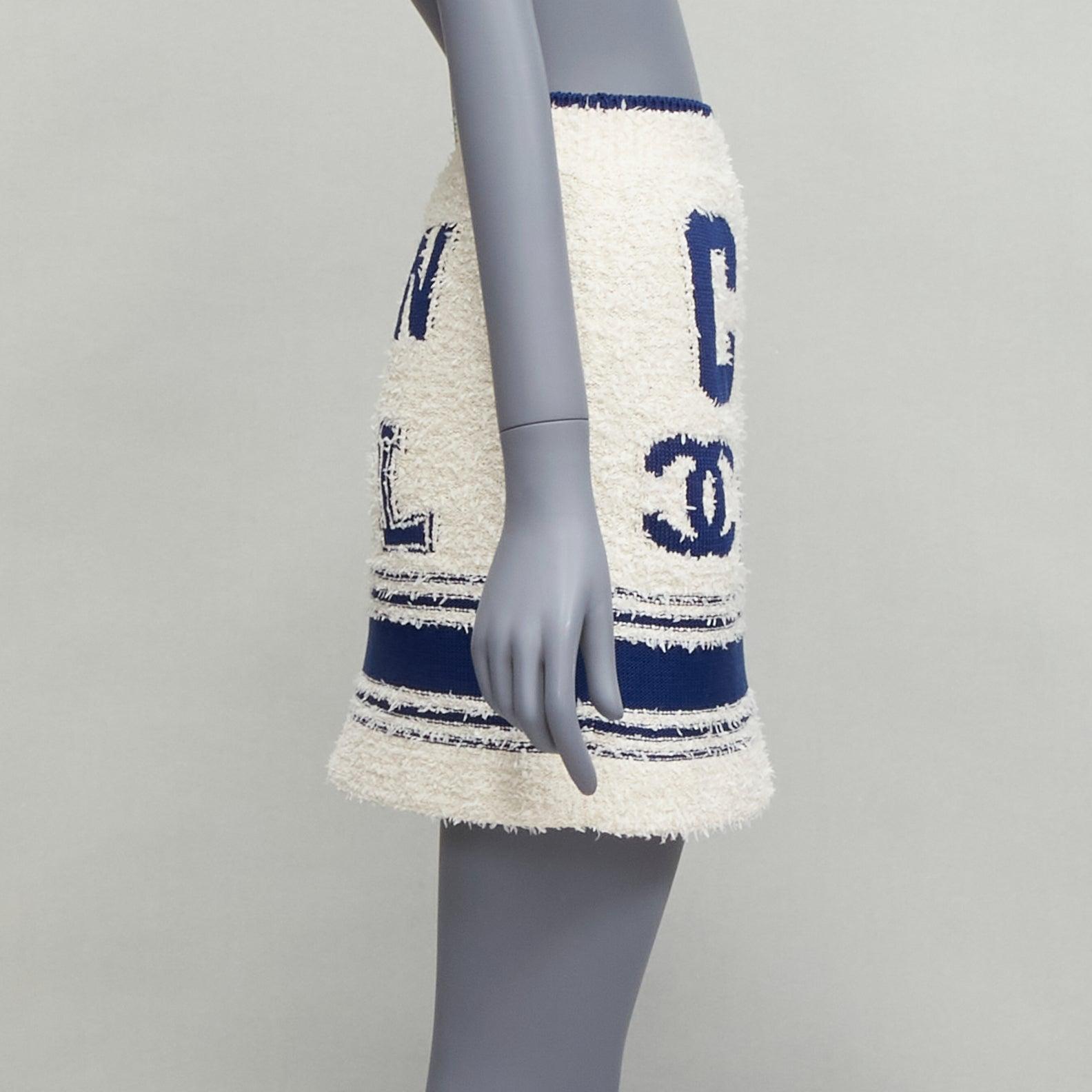 Women's CHANEL 2019 cream boucle blue CC knit logo varsity short skirt FR36 S