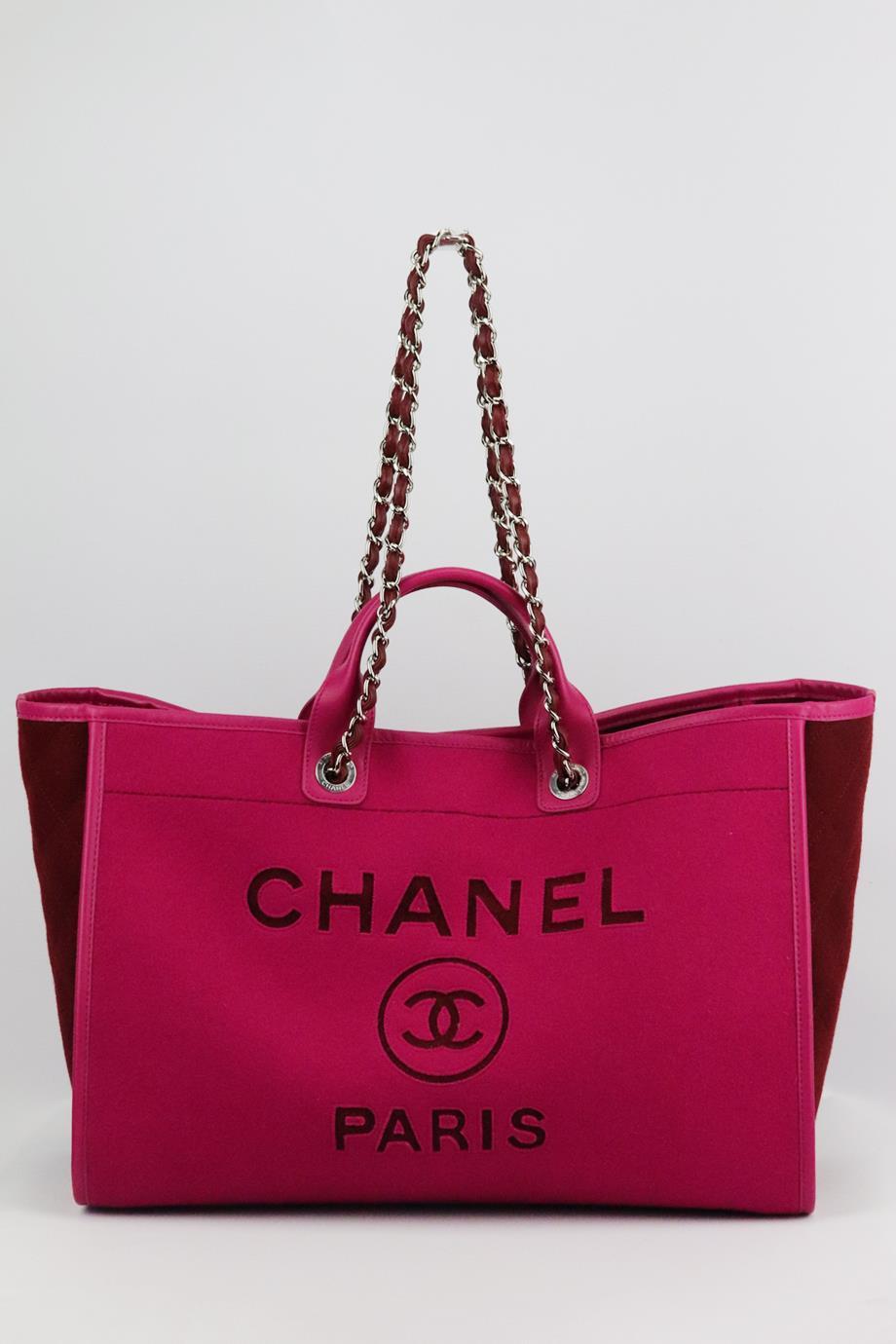 <ul>
<li>Chanel 2019 Deauville large wool felt tote bag.</li>
<li>Made from tonal-pink wool-felt with CC logo detail on the front, it has a large internal compartment with a zipped pocket and two slots.</li>
<li>Pink.</li>
<li>Magnetic snap