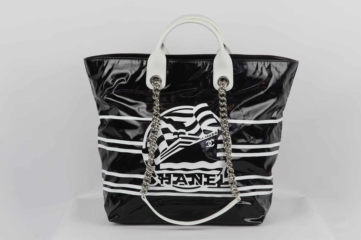 <ul>
<li>Chanel 2019 La Pausa Bay small coated canvas and leather tote bag.</li>
<li>Made in Italy, this beautiful 2019 ‘La Pausa Bay’ tote bag has been made from black and white coated-canvas exterior with black canvas interior, this piece is