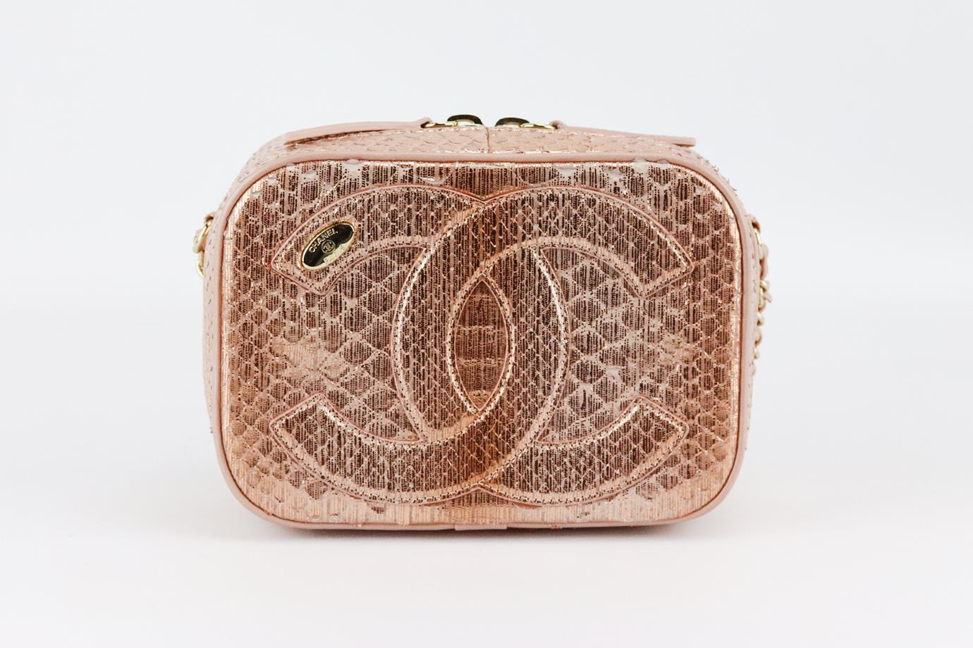 <ul>
<li>Chanel 2019 Mania Camera Case metallic python and leather shoulder bag.</li>
<li>Made from rose-gold python and leather with large CC on the front, it has a large internal compartment with slit pocket.</li>
<li>Rose-gold.</li>
<li>Zip