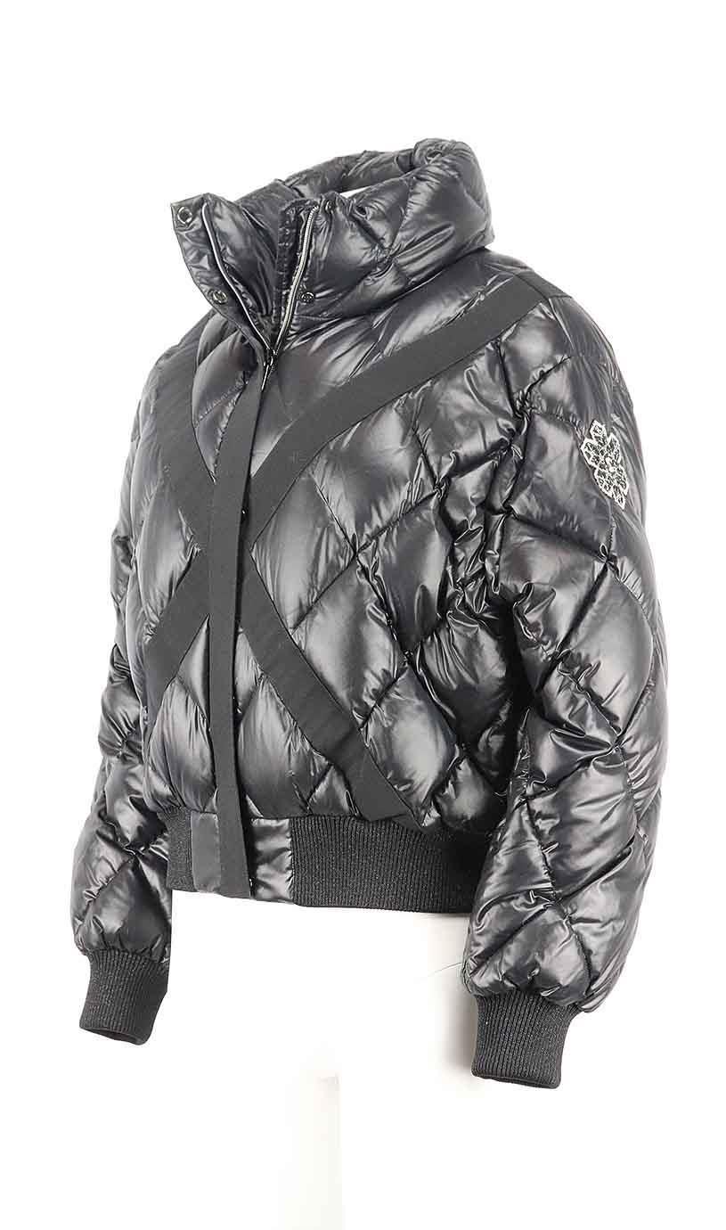 This 2019 jacket by Chanel is made in Italy from sumptuous black shell, this style is filled with insulating goose down and has glitter ribbed trims, so you're protected from the elements, it's perfect for après-ski but will also look cool worn in
