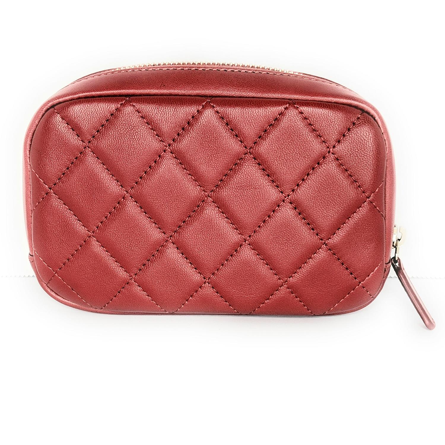 From the 2019 Collection. Red quilted Lambskin leather Chanel O-Case with gold-tone hardware, tonal quilted nylon lining, single slip pocket at interior wall and zip-closure at top.

Designer: Chanel
Material: Lambskin leather
Origin: Italy
Serial