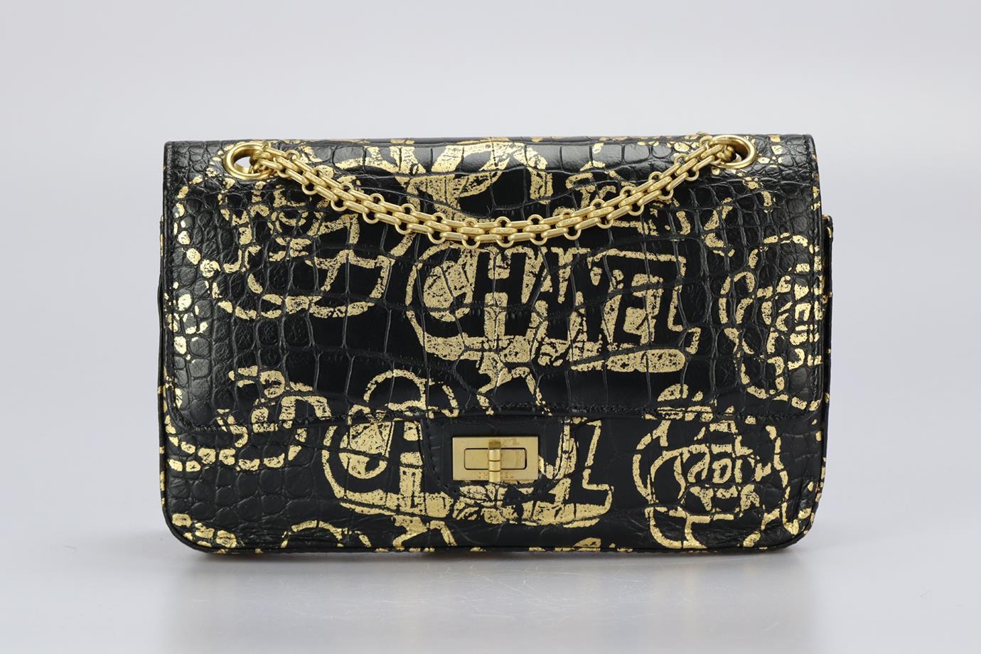 Chanel 2019 Reissue 2.55 Medium Double Flap Printed Croc Effect Leather Shoulder Bag. Gold and black. Twist lock fastening - Front. Comes with - dustbag and authenticity card. Height: 6.1 in. Width: 10 in. Depth: 2 in. Handle drop: 11.2 in. Strap