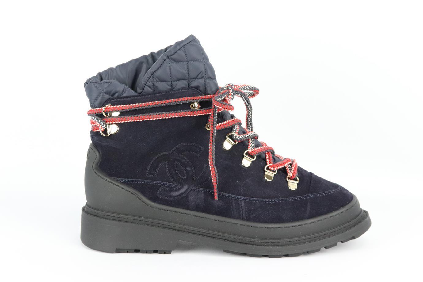 Chanel 2020 cc detailed shearling lined suede ankle boots. Navy, black and red. Lace up fastening at front. Does not come with dustbag or box. Size: EU 38.5 (5.5, US 8.5). Insole: 9.5 in. Heel: 1.25 in. New without box