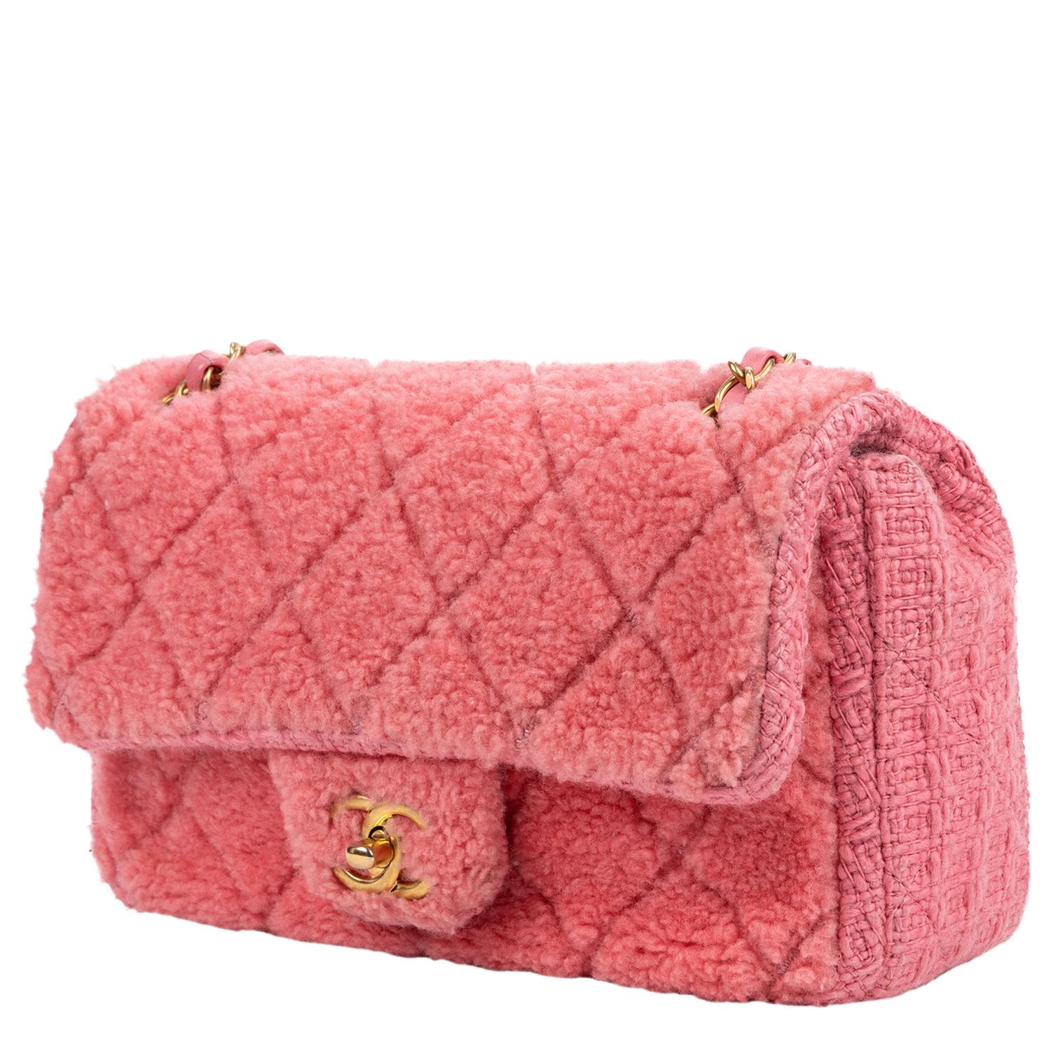 Pretty in quilted PINK! The perfect addition to your cozy Sunday in Firestone or brunch with the girls on Sunday. This limited edition is crafted in pink shearling sheepskin, gold-tone hardware, and an adjustable shoulder strap. The iconic CC